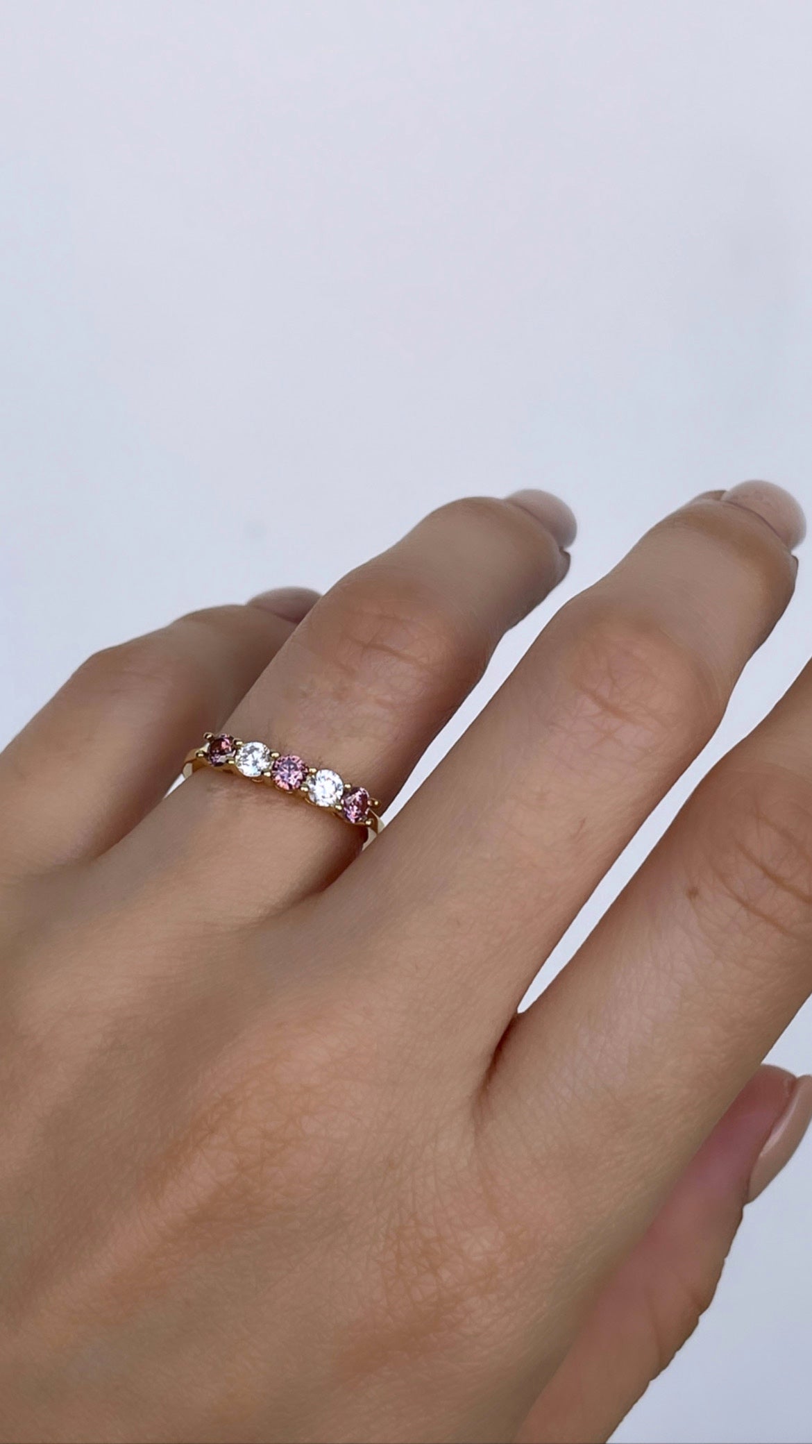 Gold Ring With White And Rhodolite Round Stone